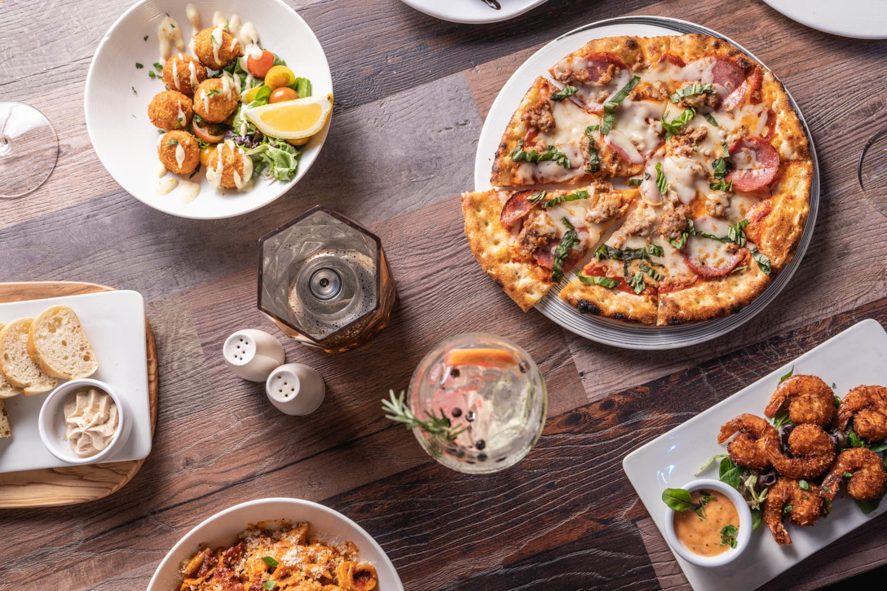 House-made pizza and shared plates — ready to bake at home